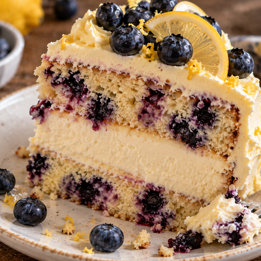 Layered Lemon Blueberry Cheesecake Cake (Showstopper Recipe!)